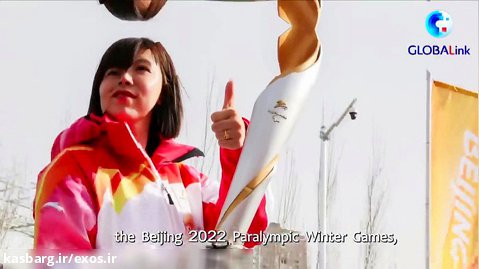 حمل مشعل المپیک با کمک اسکلت بیرونی